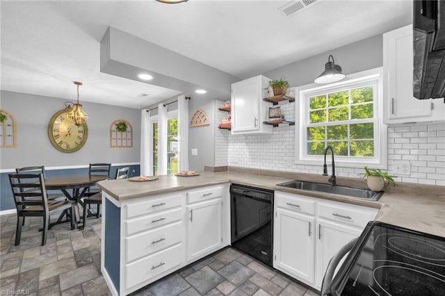 6937 US Highway 158, Stokesdale, NC 27357 - kitchen with black appliances, decorative backsplash, a peninsula, open shelves, and light stone finish flooring