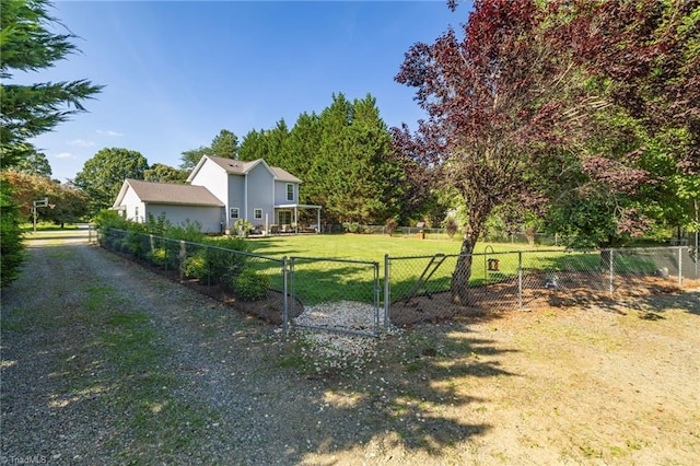 6937 US Highway 158, Stokesdale, NC 27357 - fenced yard with a gate