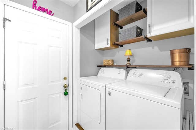 6937 US Highway 158, Stokesdale, NC 27357 - laundry room with cabinet space and washing machine and clothes dryer