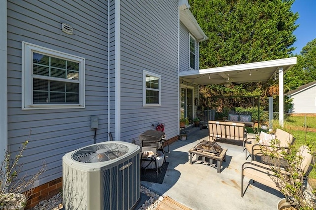 6937 US Highway 158, Stokesdale, NC 27357 - view of patio / terrace with an outdoor living space with a fire pit, ceiling fan, and grilling area