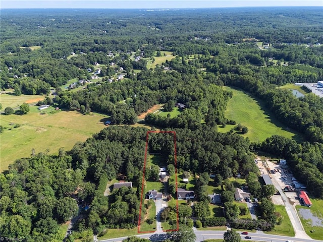 6937 US Highway 158, Stokesdale, NC 27357 - aerial view of property and surrounding area with a forest and property parcel outlined