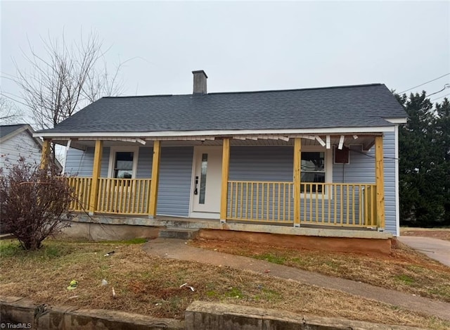 bungalow featuring covered porch