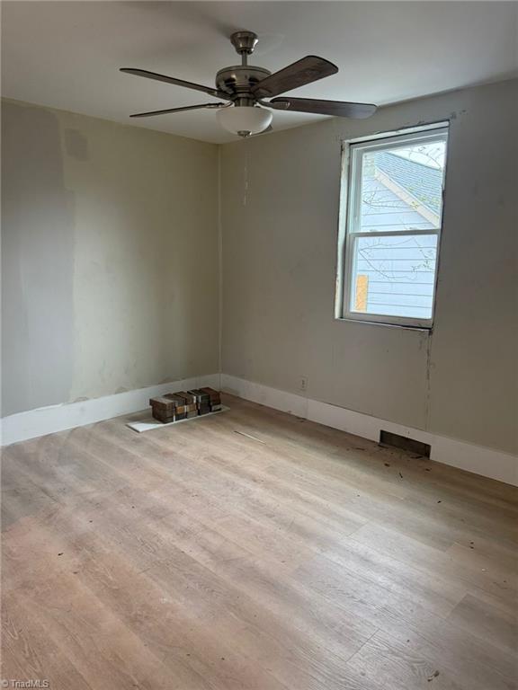 empty room featuring light hardwood / wood-style flooring