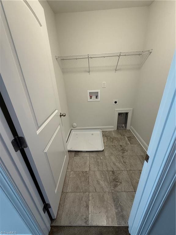 laundry room featuring hookup for a washing machine and hookup for an electric dryer