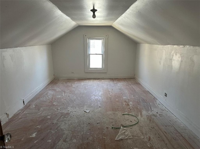bonus room featuring vaulted ceiling