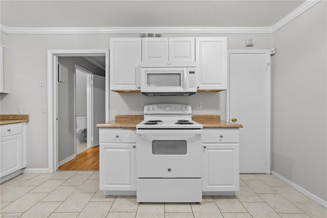 kitchen with ornamental molding, white appliances, and white cabinetry