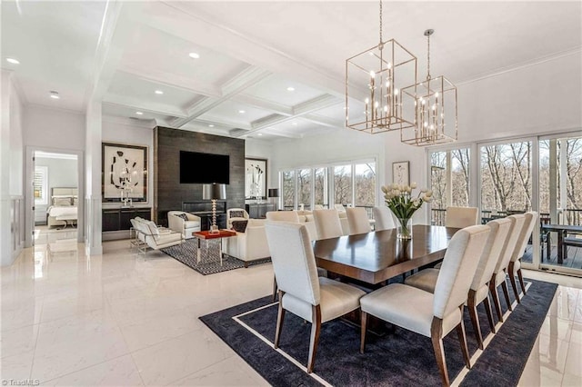 dining space featuring beam ceiling and coffered ceiling