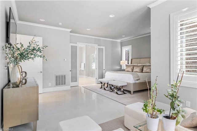 bedroom featuring ensuite bath and ornamental molding