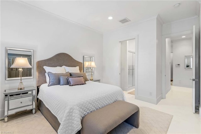 bedroom with ornamental molding and connected bathroom