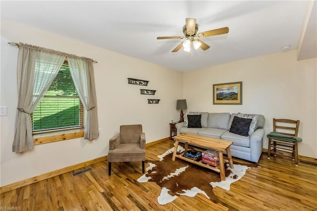 240 Deer Knoll Dr, Piney Creek, NC 28663 - living area featuring a ceiling fan and wood finished floors
