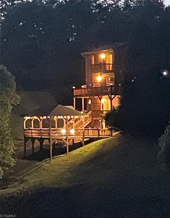 240 Deer Knoll Dr, Piney Creek, NC 28663 - back of property with a balcony