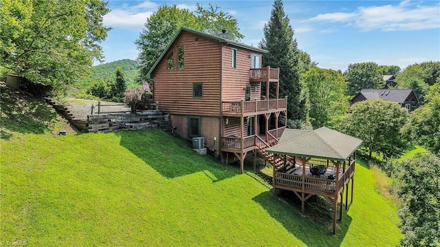 240 Deer Knoll Dr, Piney Creek, NC 28663 - back of property featuring a gazebo, a lawn, a wooden deck, and faux log siding