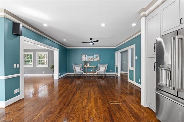 bedroom featuring wood-type flooring, ceiling fan, ornamental molding, and high quality fridge