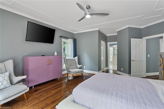 bedroom featuring ceiling fan, ornamental molding, and dark hardwood / wood-style flooring