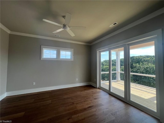 unfurnished room with crown molding, dark hardwood / wood-style flooring, and ceiling fan