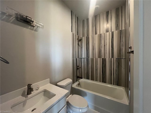 full bathroom with vanity, toilet, and washtub / shower combination