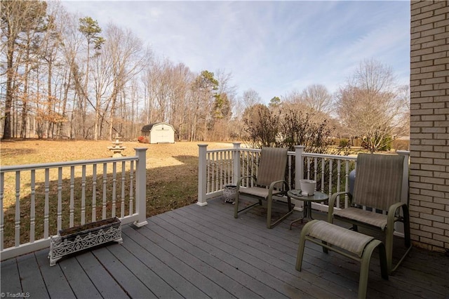 wooden terrace with a storage unit