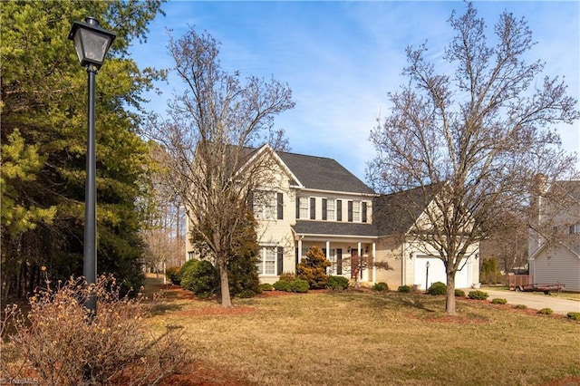 view of front of home featuring a front yard and covered porch