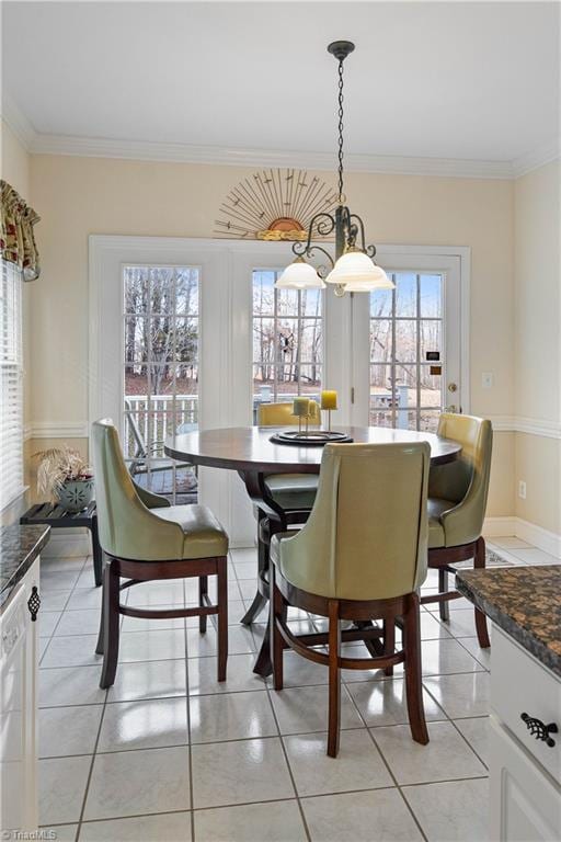 tiled dining area with crown molding