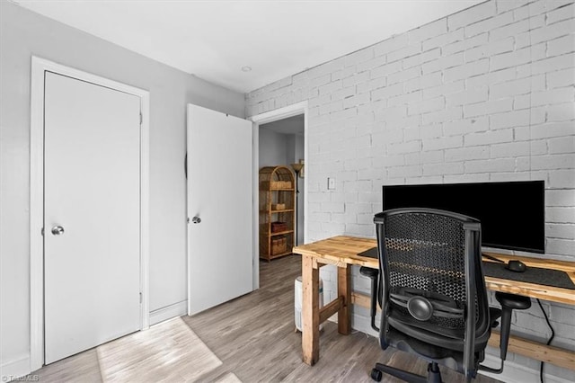 office area with light wood-type flooring