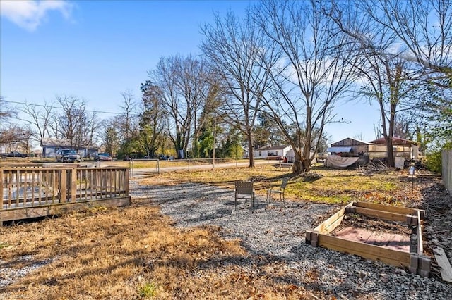 view of yard featuring a deck