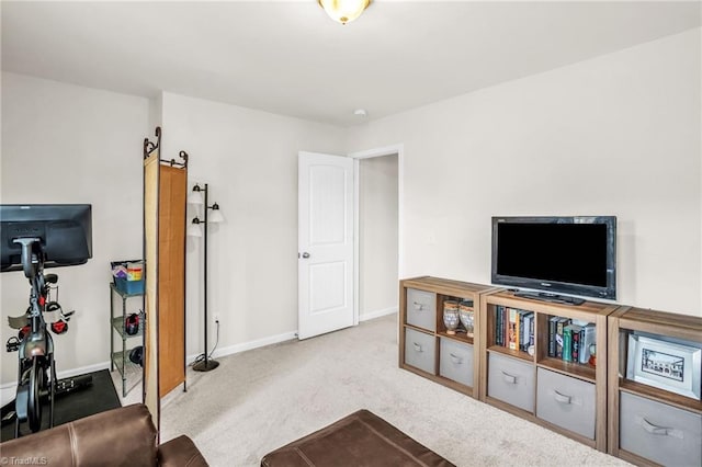 carpeted living room featuring baseboards