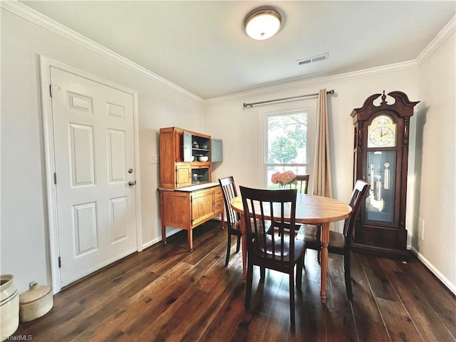 4003 Honey Locust Ct, Greensboro, NC 27410 - dining room featuring ornamental molding, dark wood-style floors, and baseboards