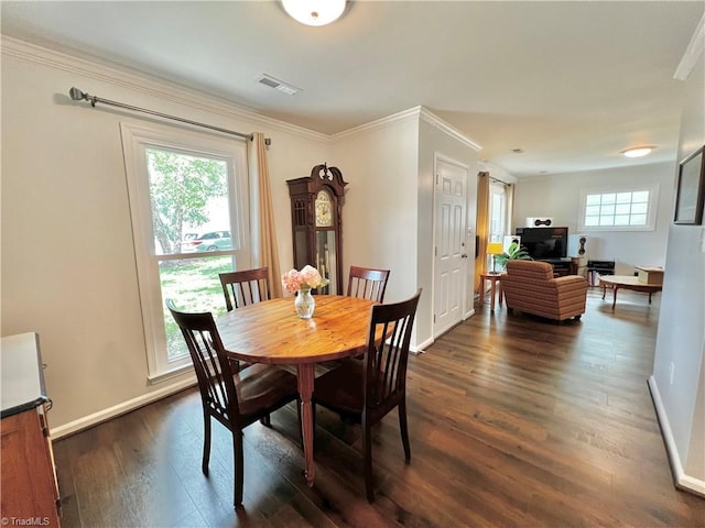 4003 Honey Locust Ct, Greensboro, NC 27410 - dining area with dark wood-type flooring, baseboards, and ornamental molding