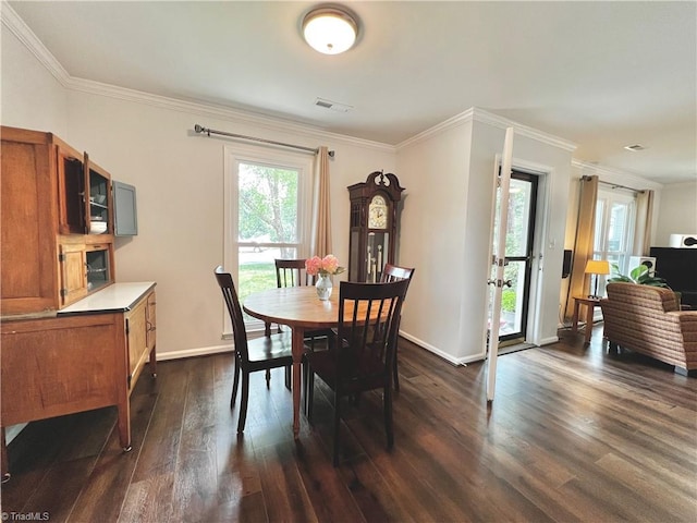 4003 Honey Locust Ct, Greensboro, NC 27410 - dining area featuring dark wood-style floors, healthy amount of natural light, ornamental molding, and baseboards