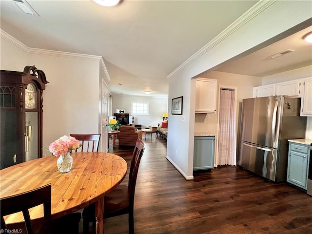 4003 Honey Locust Ct, Greensboro, NC 27410 - dining area with dark wood-style flooring, ornamental molding, and baseboards