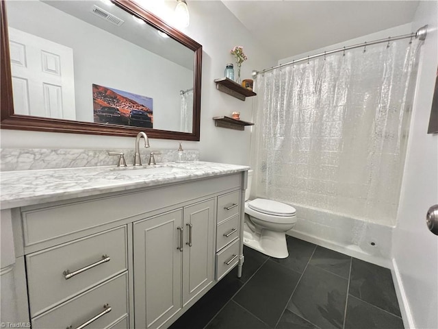 4003 Honey Locust Ct, Greensboro, NC 27410 - bathroom with vanity, toilet, and shower / tub combo with curtain