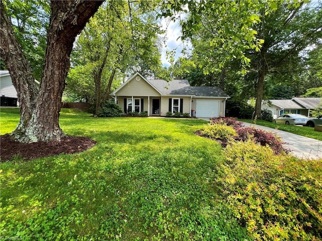 4003 Honey Locust Ct, Greensboro, NC 27410 - ranch-style home featuring a garage, driveway, and a front lawn
