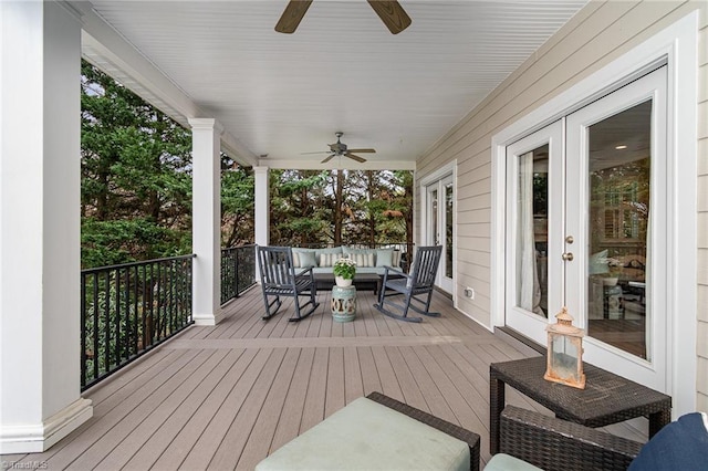 deck with an outdoor hangout area, french doors, and a ceiling fan