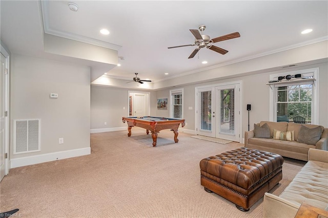 recreation room with visible vents, light carpet, ornamental molding, and french doors