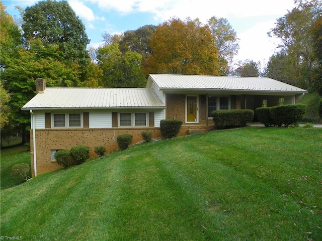 view of front of house with a front lawn