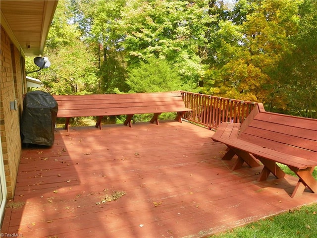 wooden deck with area for grilling