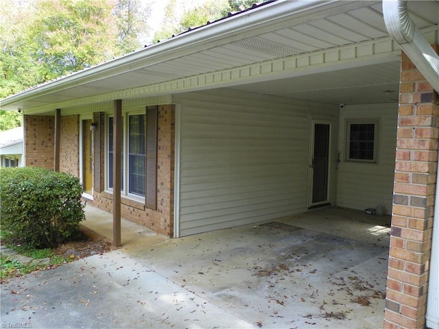 exterior space featuring a carport