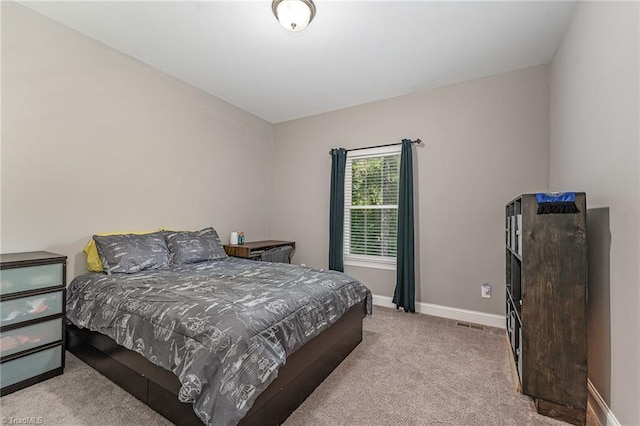 817 Jefferson Rd, Greensboro, NC 27410 - carpeted bedroom with baseboards