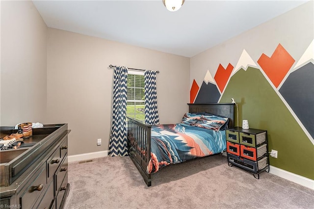 817 Jefferson Rd, Greensboro, NC 27410 - carpeted bedroom featuring baseboards