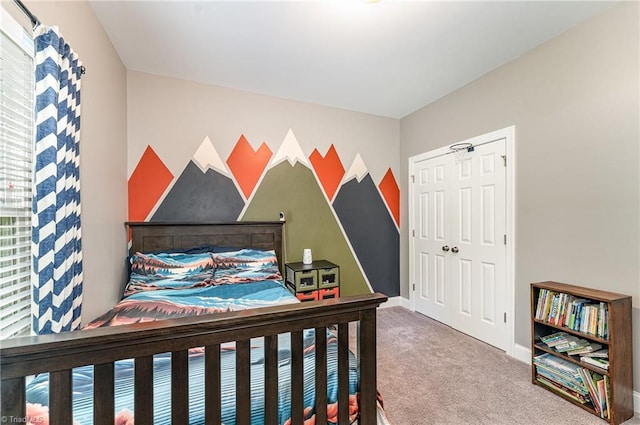 817 Jefferson Rd, Greensboro, NC 27410 - bedroom with carpet floors, baseboards, and a closet