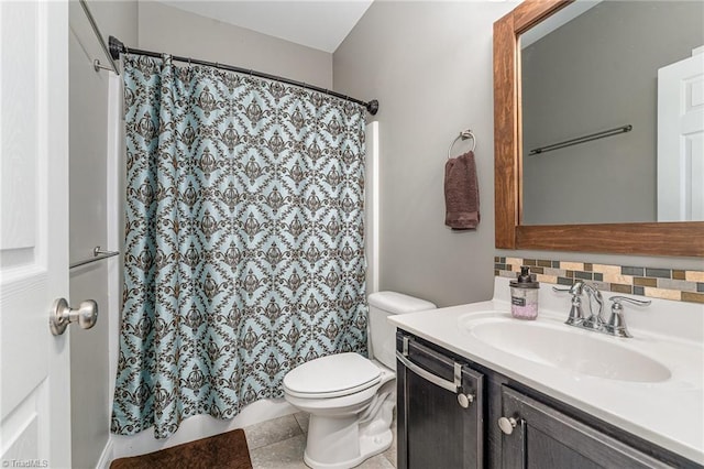 817 Jefferson Rd, Greensboro, NC 27410 - full bath featuring vanity, toilet, a shower with shower curtain, and tasteful backsplash
