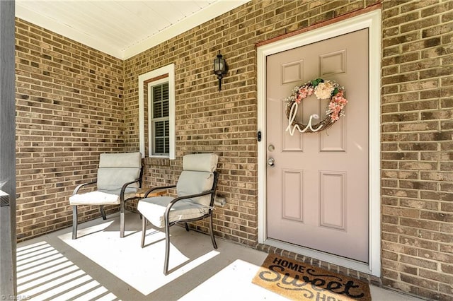 817 Jefferson Rd, Greensboro, NC 27410 - entrance to property with brick siding and covered porch