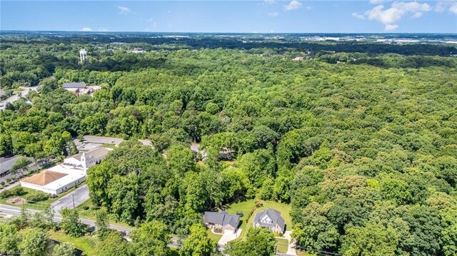817 Jefferson Rd, Greensboro, NC 27410 - drone / aerial view of a heavily wooded area
