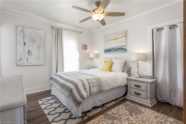 bedroom featuring a ceiling fan, baseboards, ornamental molding, and dark wood-type flooring