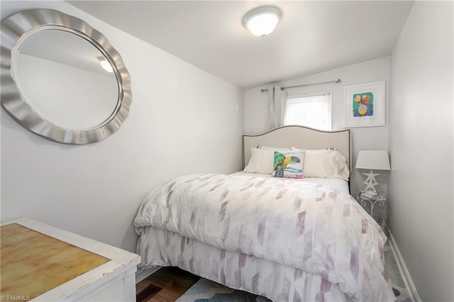 bedroom featuring visible vents