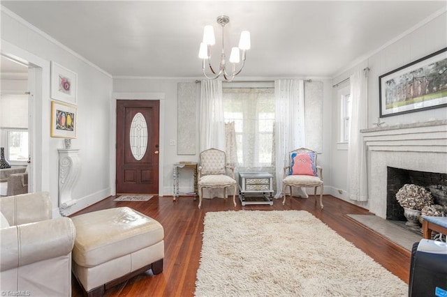 living room with crown molding, dark wood-style flooring, and a wealth of natural light