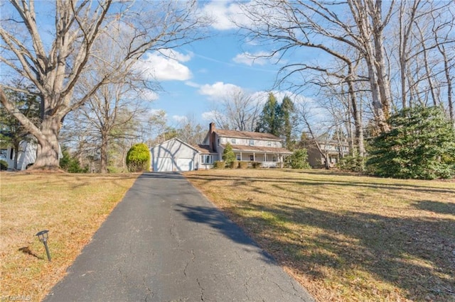 view of front of property with a front lawn