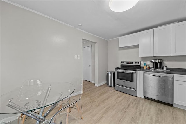 kitchen featuring white cabinetry, crown molding, light hardwood / wood-style floors, and appliances with stainless steel finishes