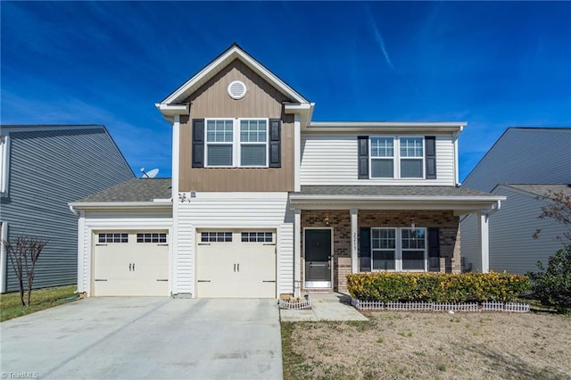 view of front of property featuring driveway and brick siding