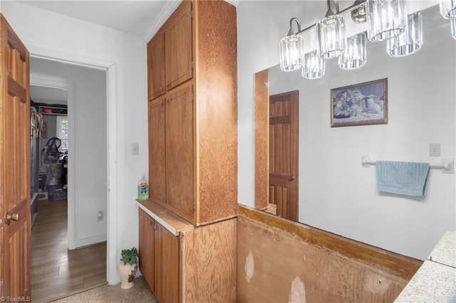 interior space featuring hardwood / wood-style flooring and a notable chandelier